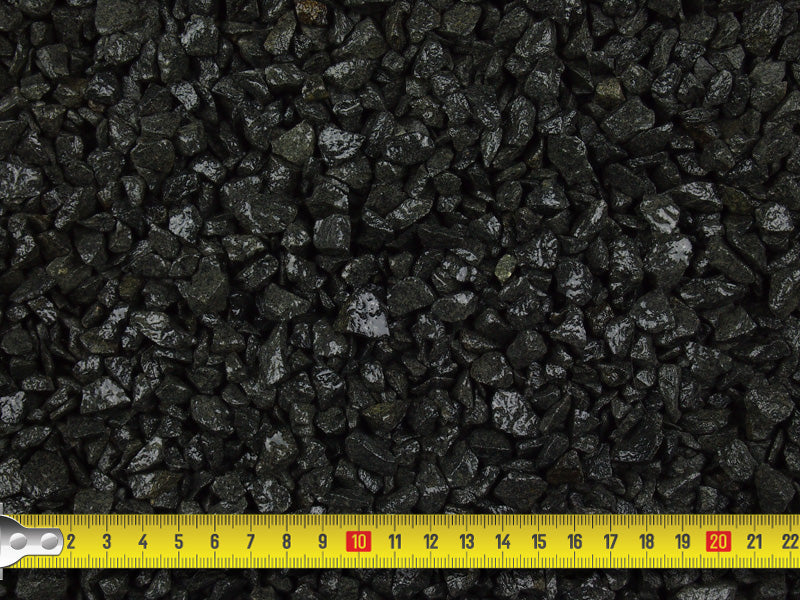 Measuring tape demonstrating that the size of the aggregate is between 10-20mm