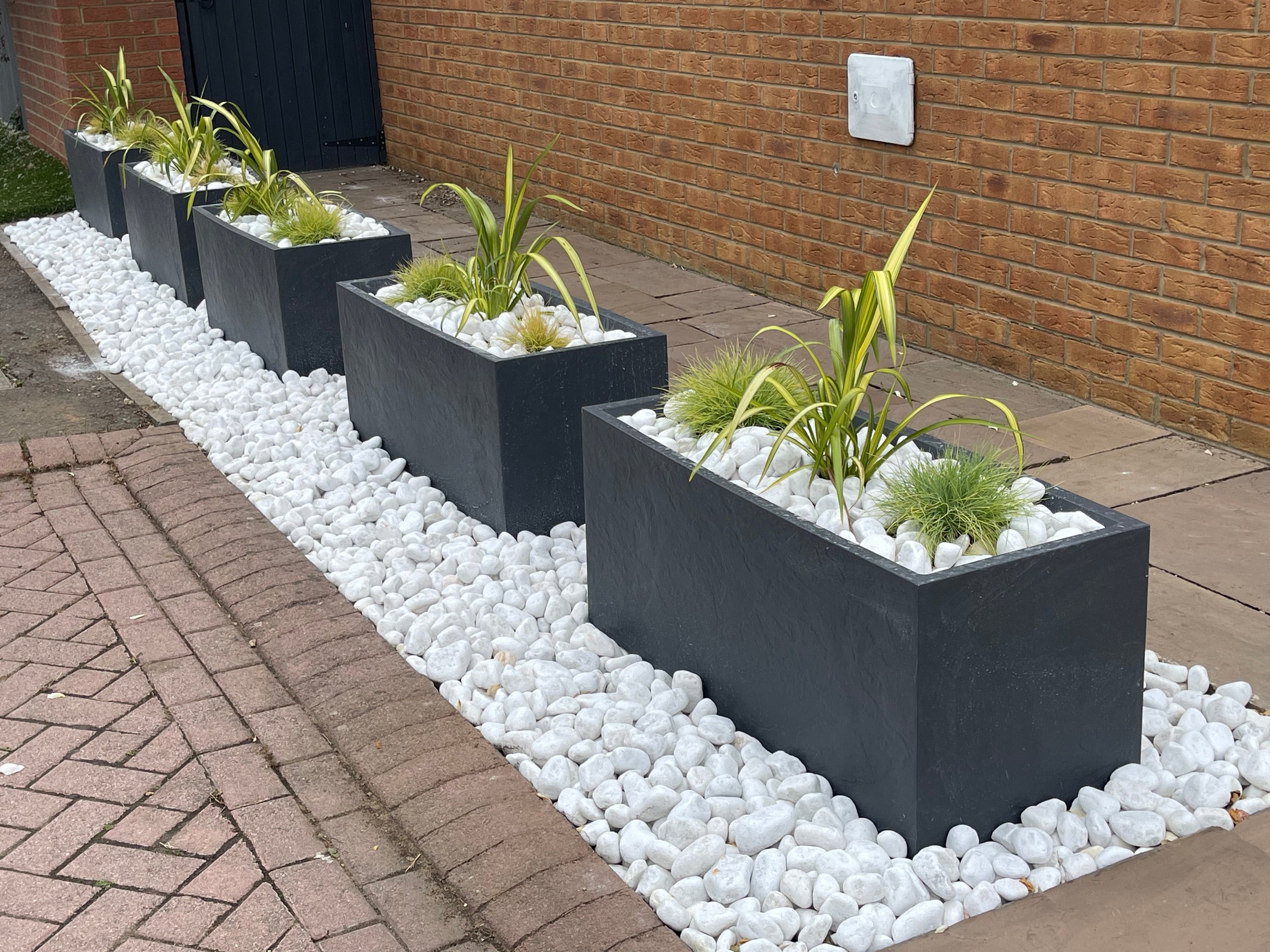 White stones used as a plant topper