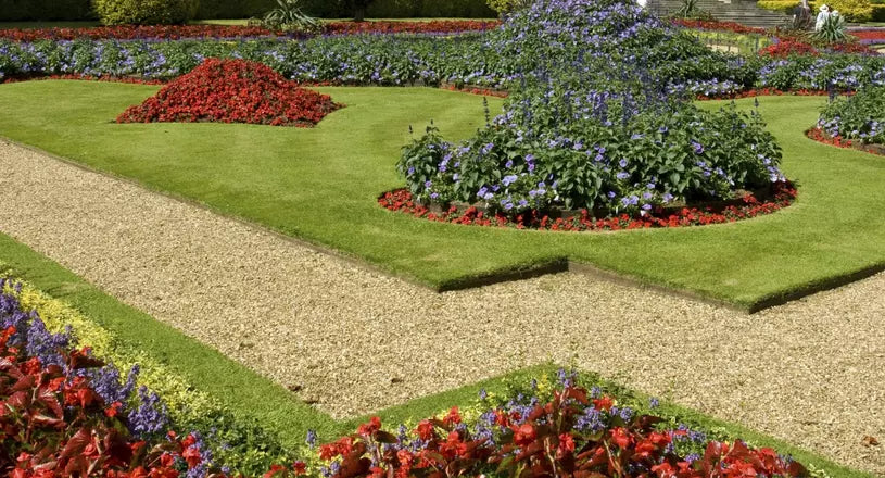 Landscaped gardens with a neat, golden gravel path