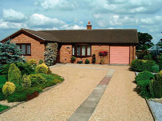 a golden gravel driveway