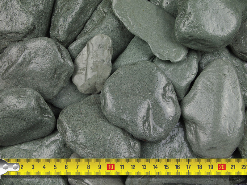 Measuring tape demonstrating the size of the paddlestones