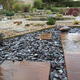 snowdonia tumbled slate laid in garden for decorative ground cover