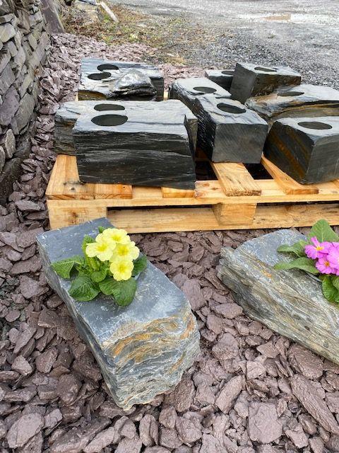 slate planters with yellow flower 
