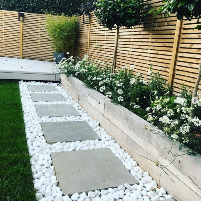 Polar white cobble stones in garden path