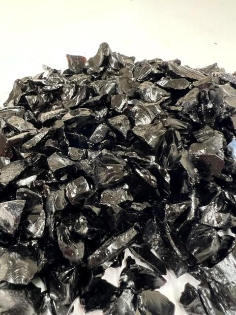 close photo of jet black glass chippings for garden decor 
