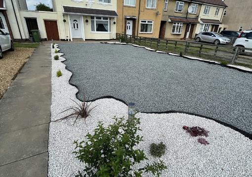Dove Grey Gravel laid for the whole Front Garden of customer home. 
