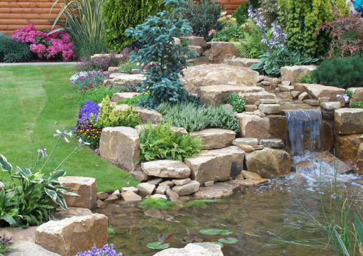 Gritstone rockery in garden water feature