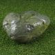 close up of a green welsh quartz granite boulder